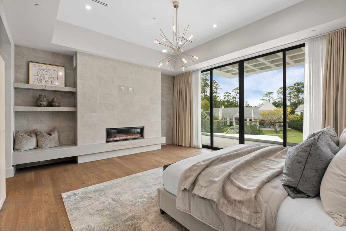 Bedroom, Fireplace, Interior, Pendant Lights, Recessed Lighting, Wood Texture Flooring