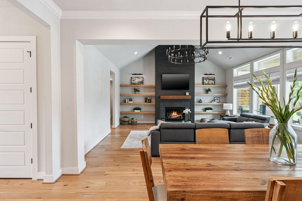 Dining room, Fireplace, Interior, Living room, Pendant Lights, Recessed Lighting, Wood Texture Flooring