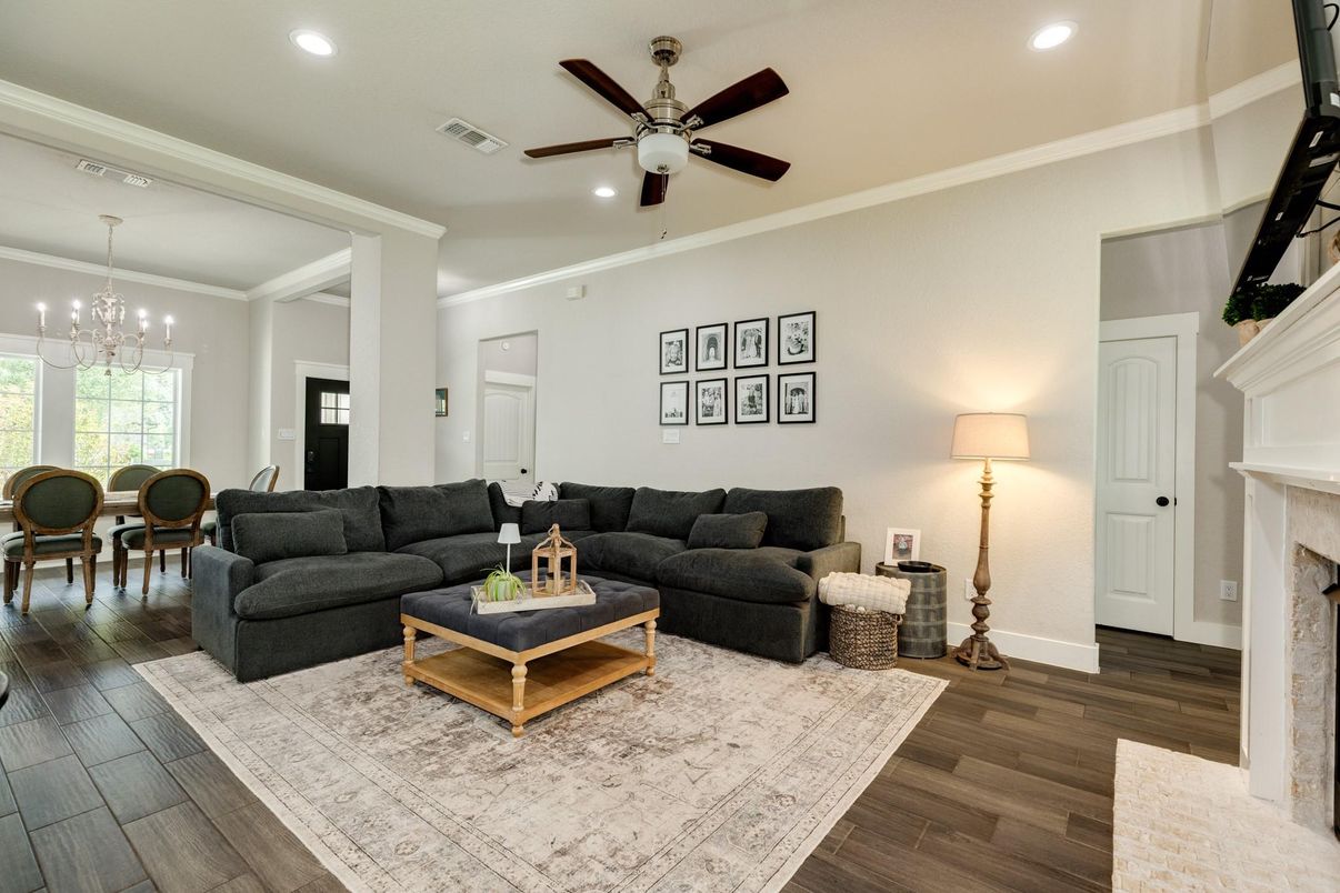 Dining room, Fireplace, Interior, Living room, Pendant Lights, Recessed Lighting, Wood Texture Flooring