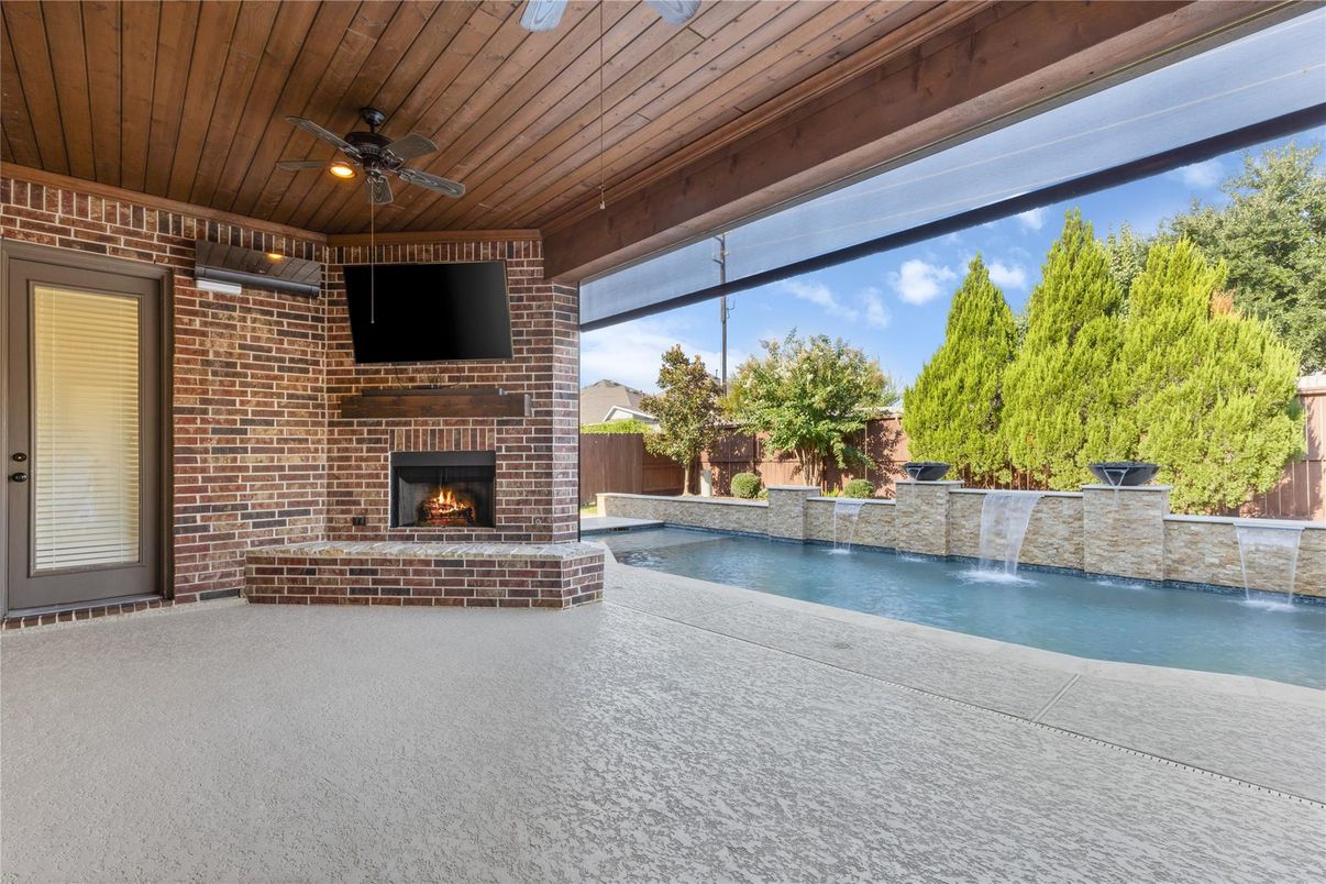 Exterior, Fireplace, Pool, Stone Walls