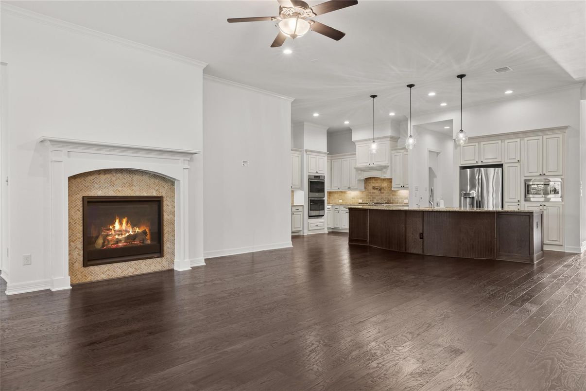 Fireplace, Interior, Kitchen, Pendant Lights, Recessed Lighting, Stainless Steel Appliances, Wood Texture Flooring