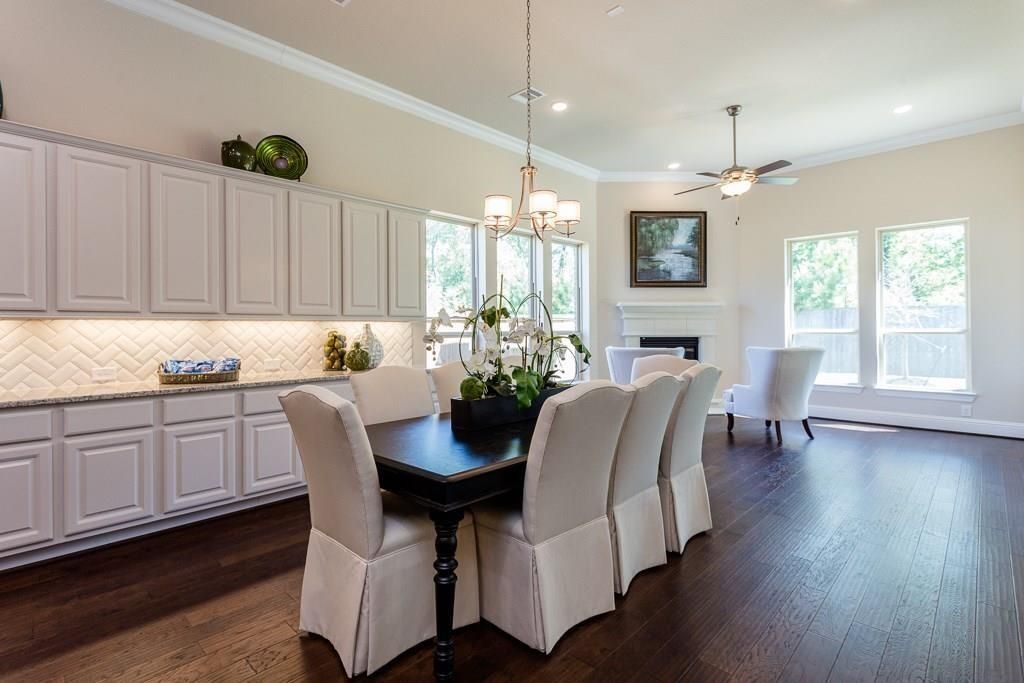 Chandelier, Dining room, Fireplace, Interior, Recessed Lighting, Wood Texture Flooring