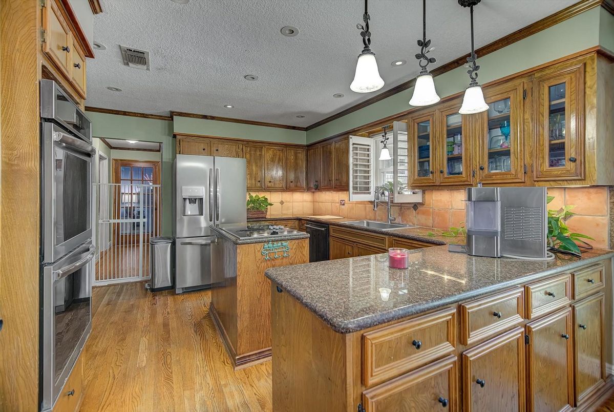 Interior, Kitchen, Pendant Lights, Recessed Lighting, Stainless Steel Appliances, Wood Texture Flooring