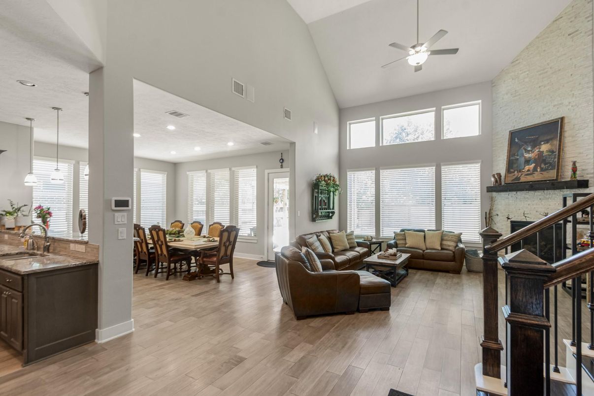 Dining room, Fireplace, Interior, Living room, Pendant Lights, Recessed Lighting, Stone Walls, Wood Texture Flooring