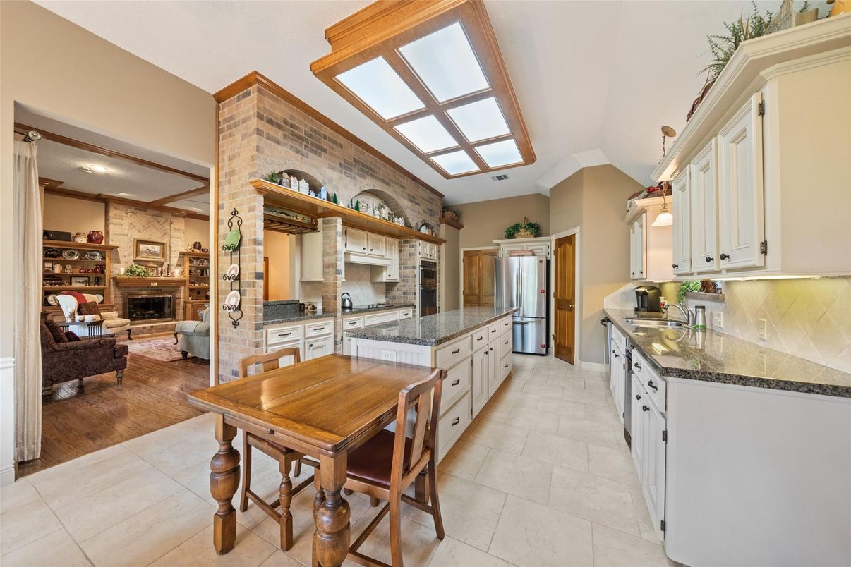 Fireplace, Interior, Kitchen, Living room, Pendant Lights, Stone Walls, Wood Texture Flooring