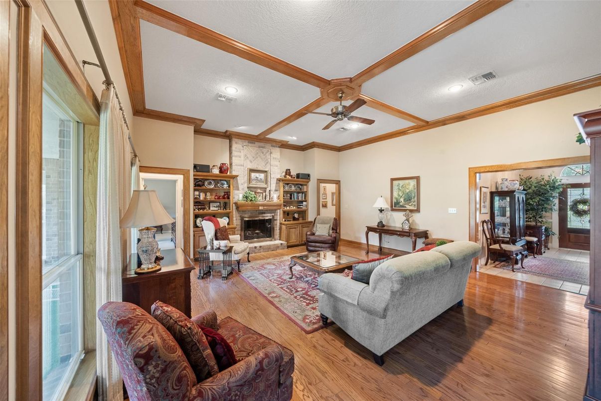Dining room, Fireplace, Interior, Living room, Recessed Lighting, Wood Texture Flooring
