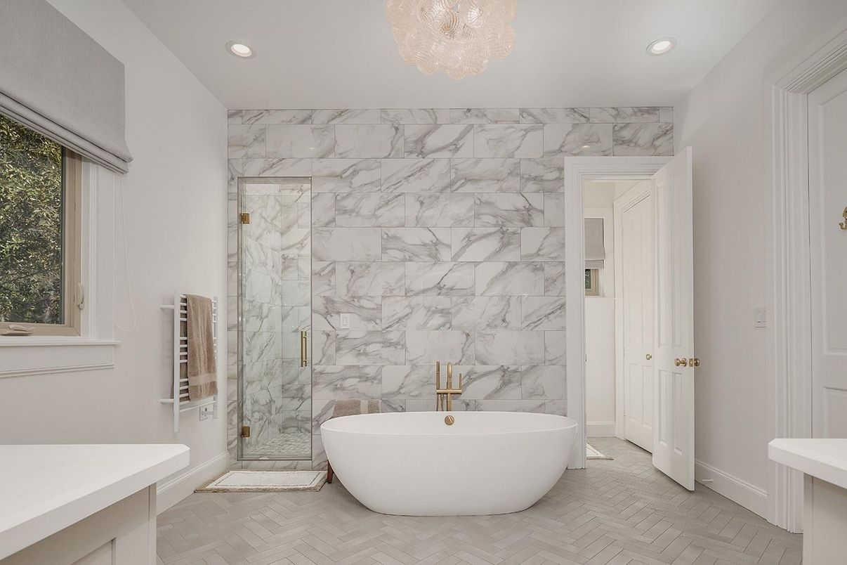 Bathroom, Free Standing Baths, Glass Shower, Interior, Marble Walls, Recessed Lighting, Wood Texture Flooring