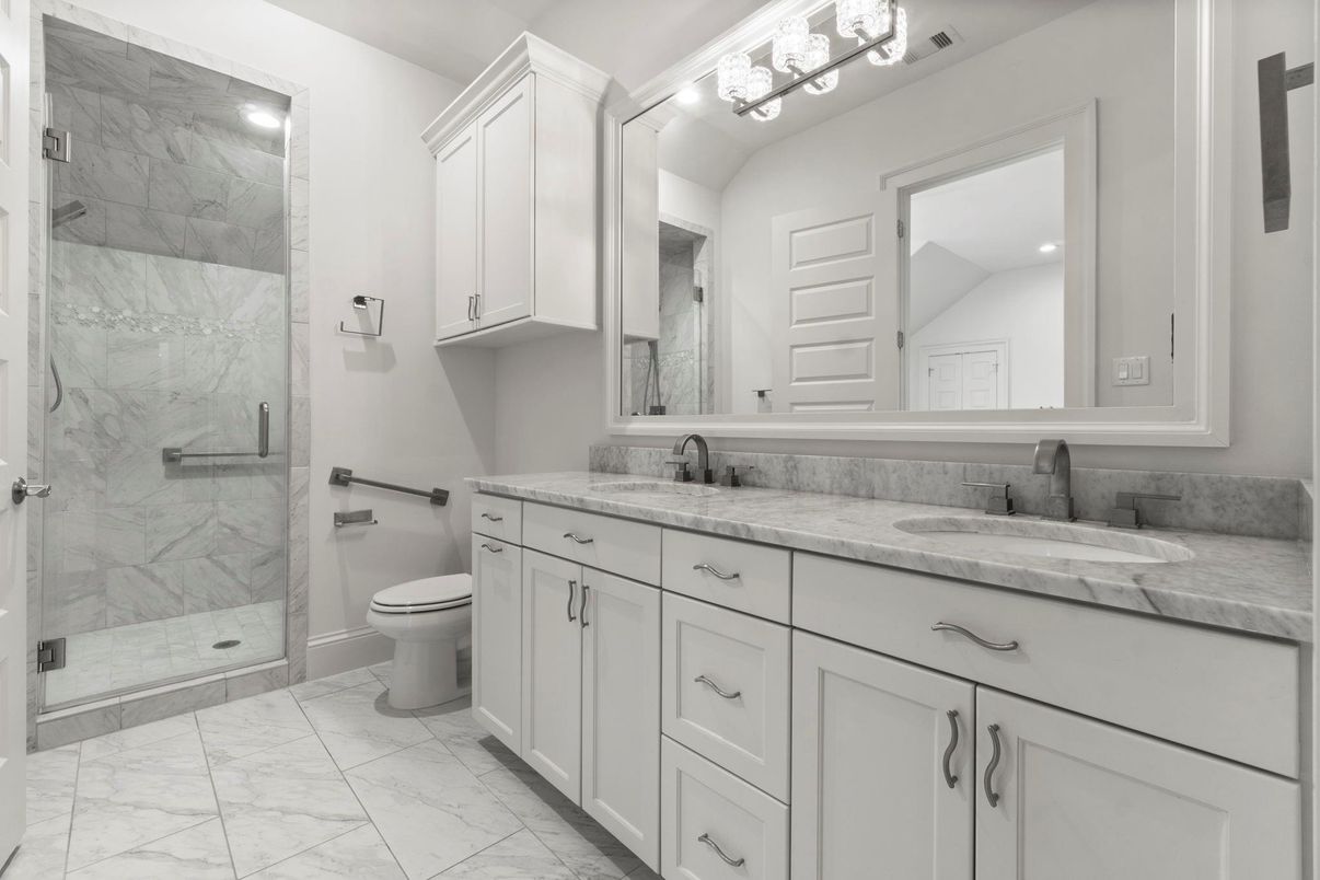 Bathroom, Dual Sink Vanities, Glass Shower, Interior, Marble, Marble Walls, Recessed Lighting