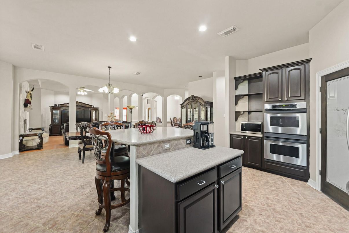 Chandelier, Dining room, Interior, Kitchen, Pendant Lights, Recessed Lighting, Stainless Steel Appliances