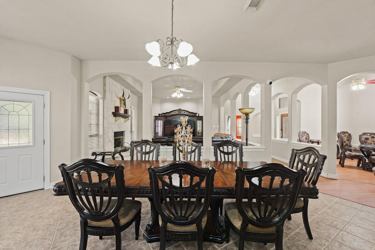 Chandelier, Dining room, Fireplace, Interior, Pendant Lights