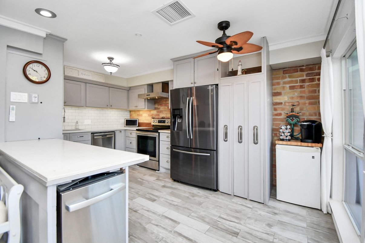 Interior, Kitchen, Recessed Lighting, Stainless Steel Appliances, Stone Walls, Wood Texture Flooring
