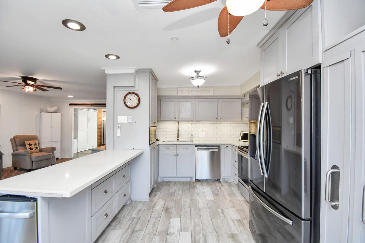 Interior, Kitchen, Recessed Lighting, Stainless Steel Appliances, Wood Texture Flooring