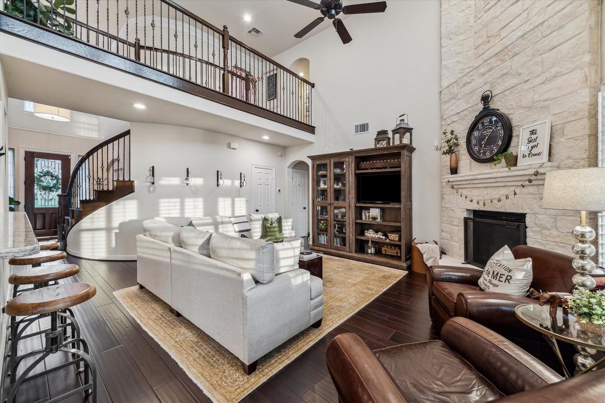 Fireplace, Interior, Living room, Recessed Lighting, Stone Walls, Wood Texture Flooring