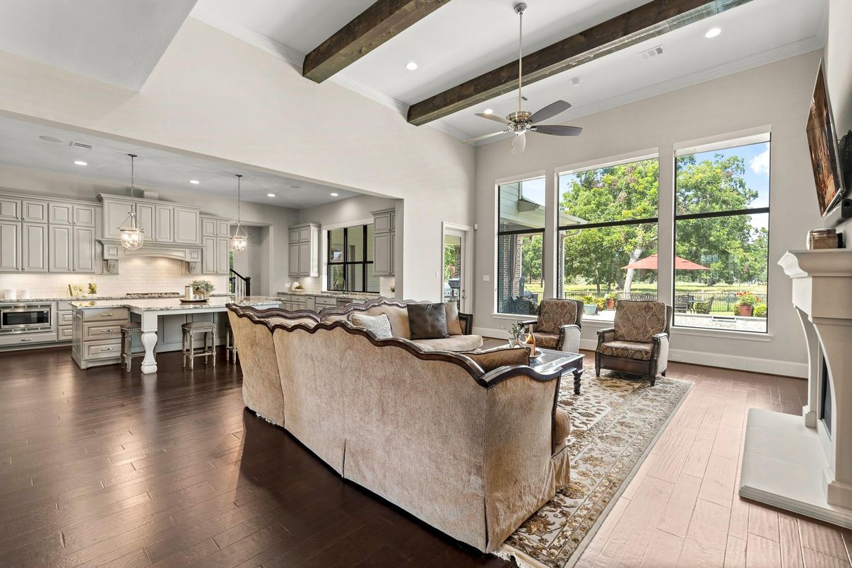 Fireplace, Interior, Kitchen, Living room, Pendant Lights, Recessed Lighting, Stainless Steel Appliances, Wooden Beams, Wood Texture Flooring