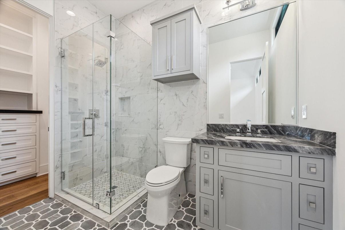Bathroom, Glass Shower, Interior, Marble Walls, Wood Texture Flooring