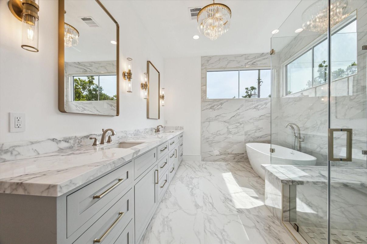 Bathroom, Chandelier, Dual Sink Vanities, Free Standing Baths, Glass Shower, Interior, Marble, Marble Walls, Recessed Lighting