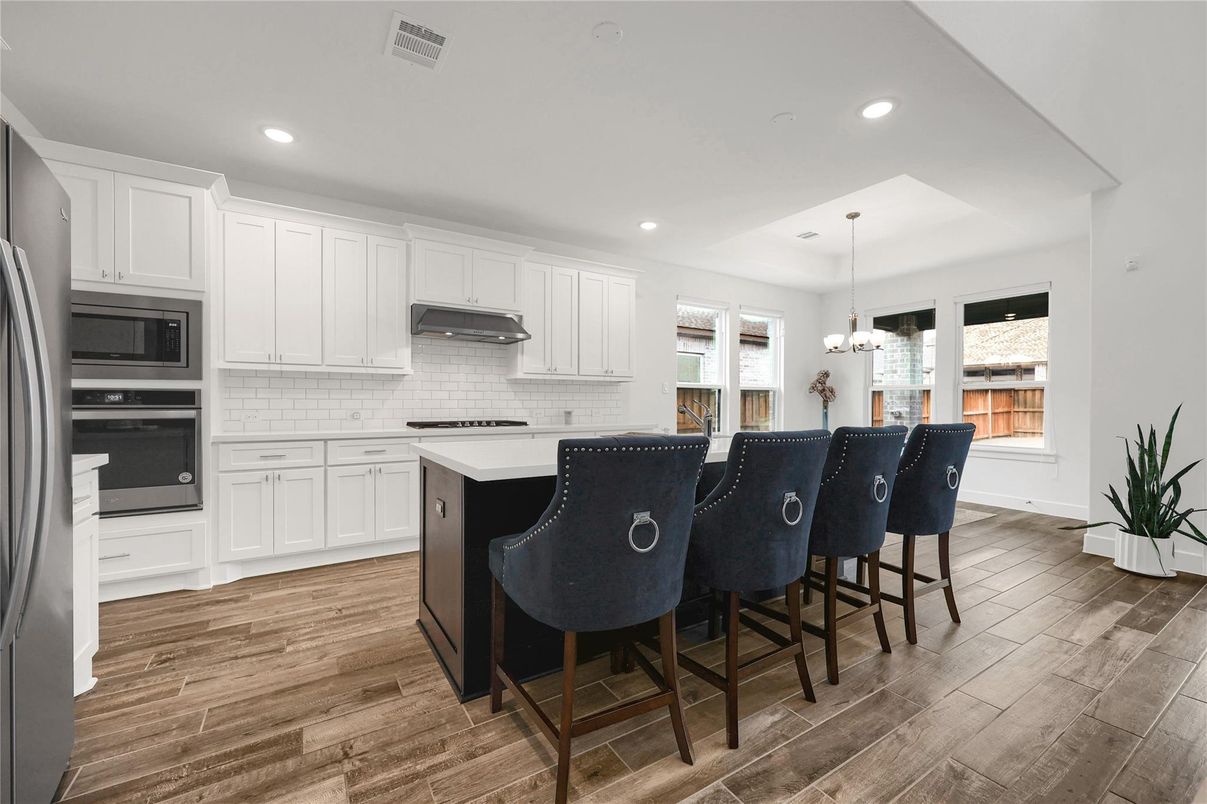 Chandelier, Interior, Kitchen, Pendant Lights, Recessed Lighting, Stainless Steel Appliances, Wood Texture Flooring