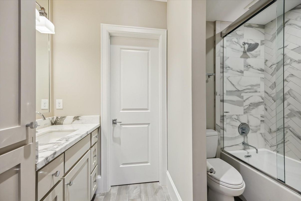 Bathroom, Glass Shower, Interior, Marble Walls, Wood Texture Flooring