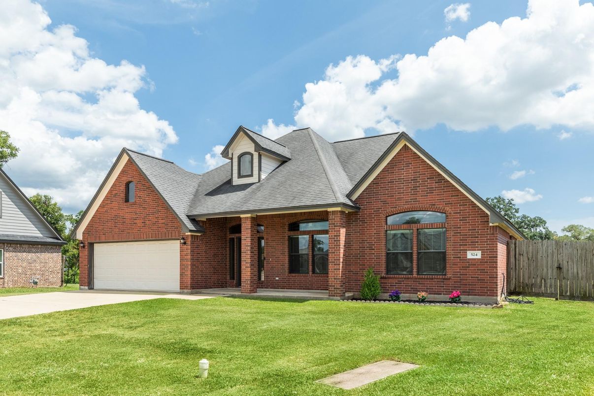 Attached, Exterior, Facade, Brick Facade, Brick Traditional