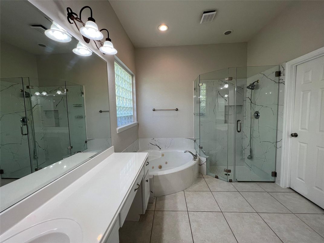 Bathroom, Free Standing Baths, Glass Shower, Interior, Marble Walls, Recessed Lighting