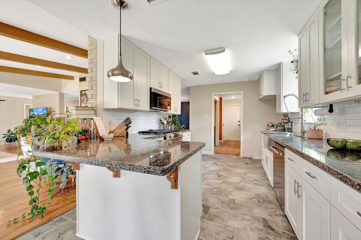 Interior, Kitchen, Pendant Lights, Recessed Lighting, Stainless Steel Appliances, Stone Walls, Wooden Beams