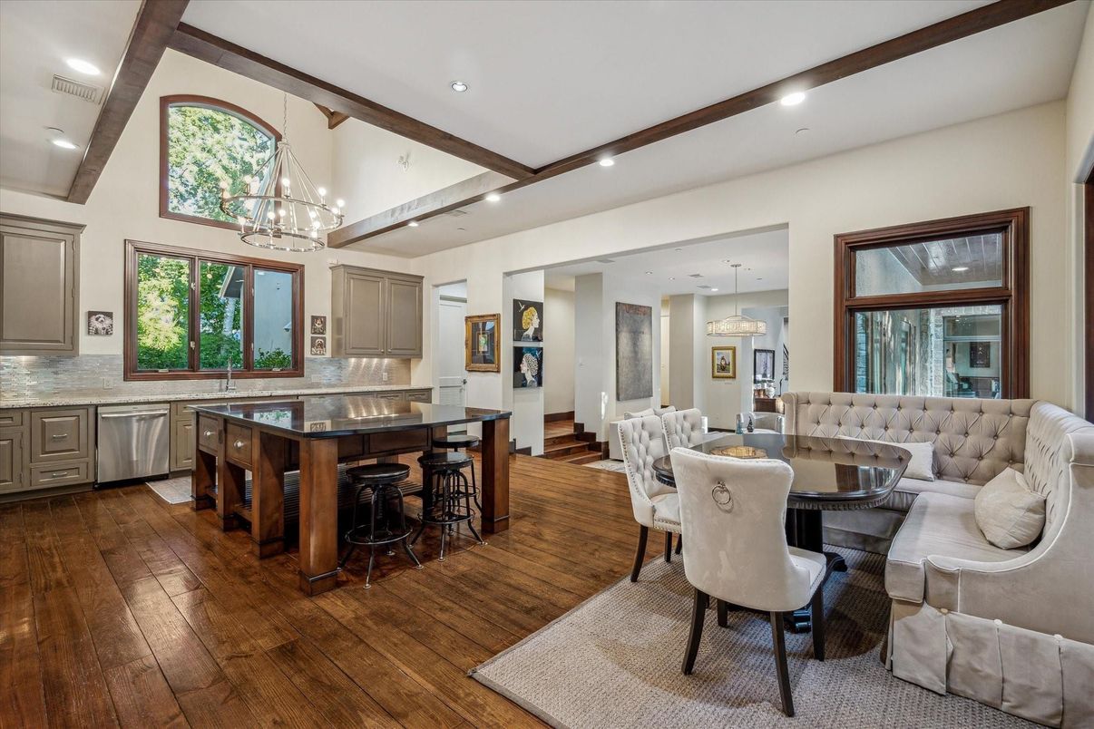Chandelier, Dining room, Interior, Kitchen, Living room, Pendant Lights, Recessed Lighting, Stainless Steel Appliances, Wooden Beams, Wood Texture Flooring