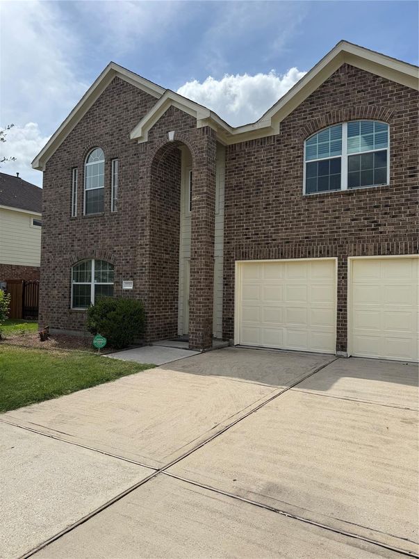 Attached, Exterior, Facade, Brick Facade, Brick Traditional