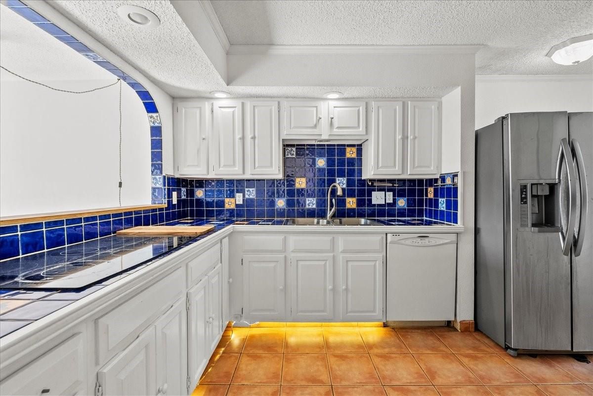 Interior, Kitchen, Recessed Lighting, Tile Countertops