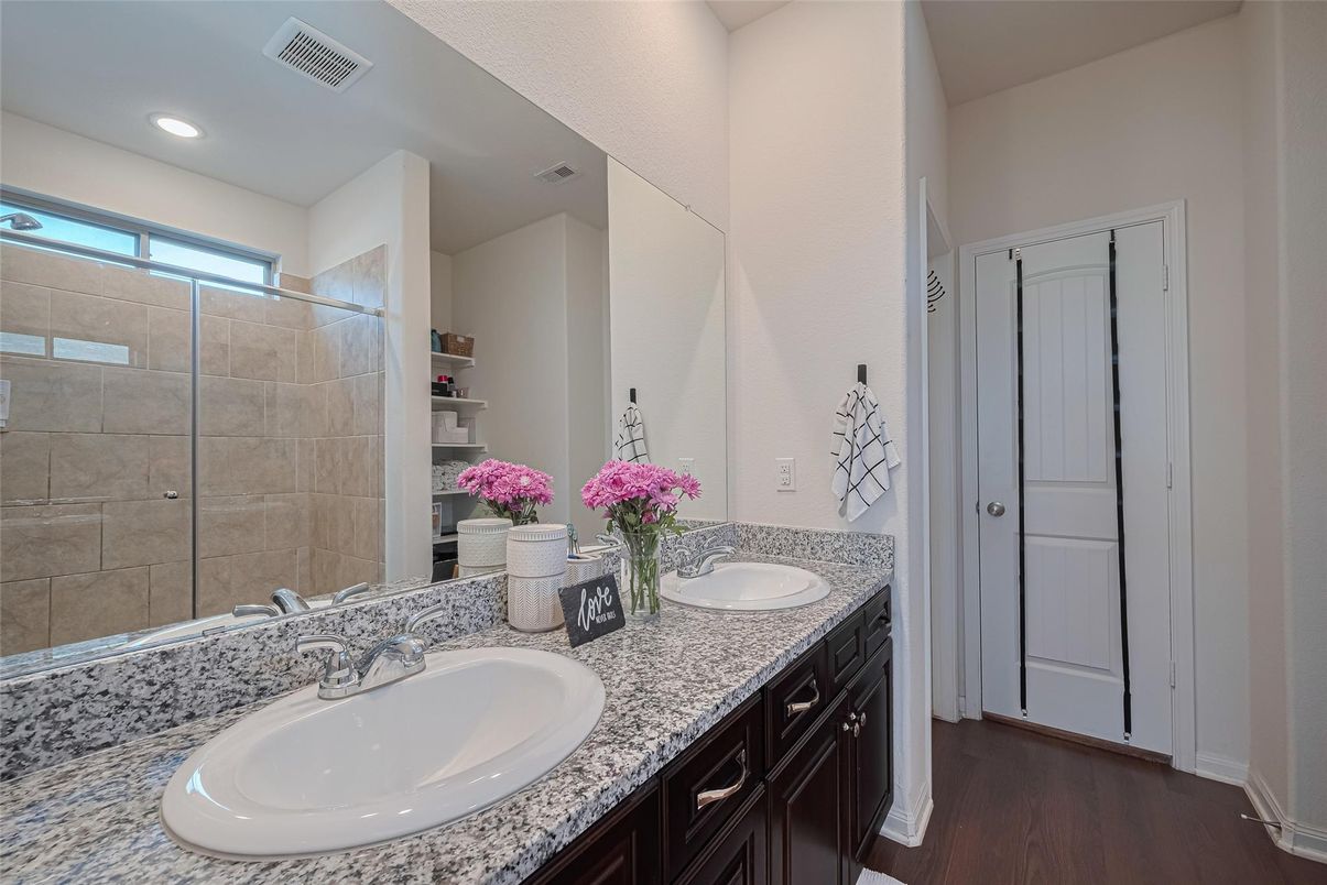 Bathroom, Dual Sink Vanities, Interior, Recessed Lighting, Wood Texture Flooring