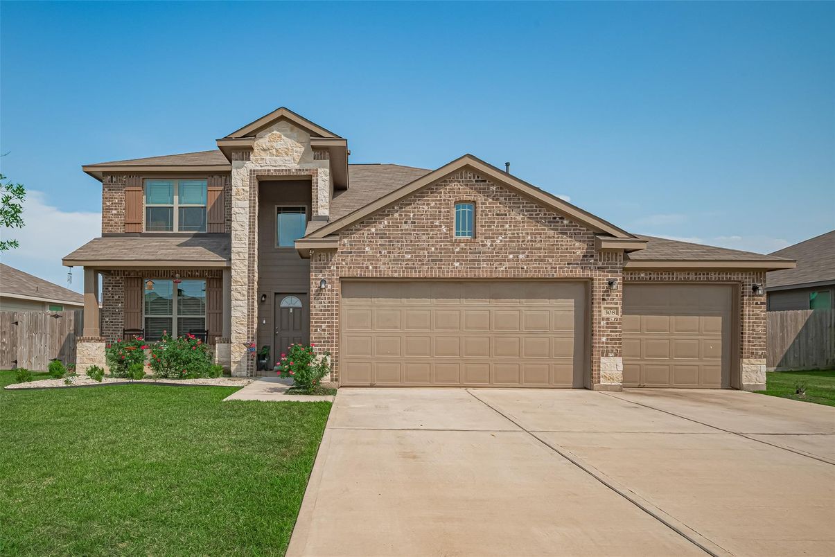 Attached, Exterior, Facade, Brick Facade, Brick Traditional