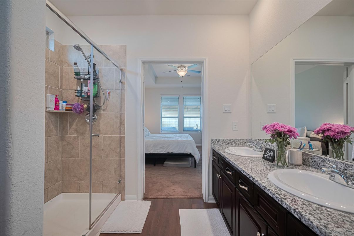 Bathroom, Bedroom, Dual Sink Vanities, Glass Shower, Interior, Wood Texture Flooring