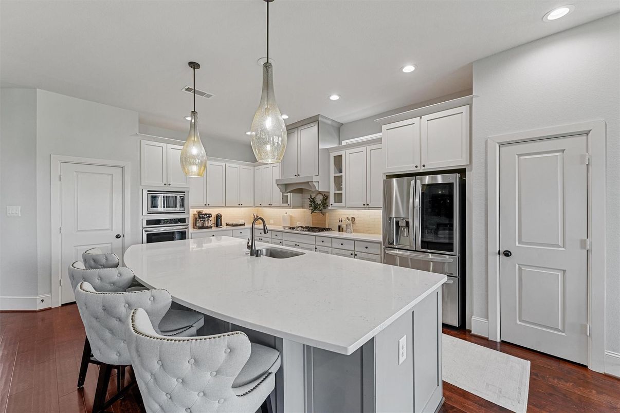 Interior, Kitchen, Pendant Lights, Recessed Lighting, Stainless Steel Appliances, Wood Texture Flooring