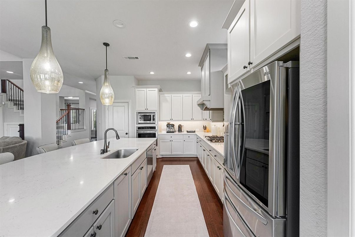 Interior, Kitchen, Pendant Lights, Recessed Lighting, Stainless Steel Appliances, Wood Texture Flooring