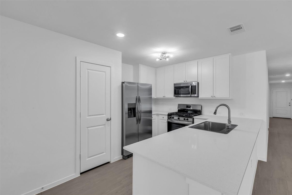 Interior, Kitchen, Recessed Lighting, Stainless Steel Appliances, Wood Texture Flooring