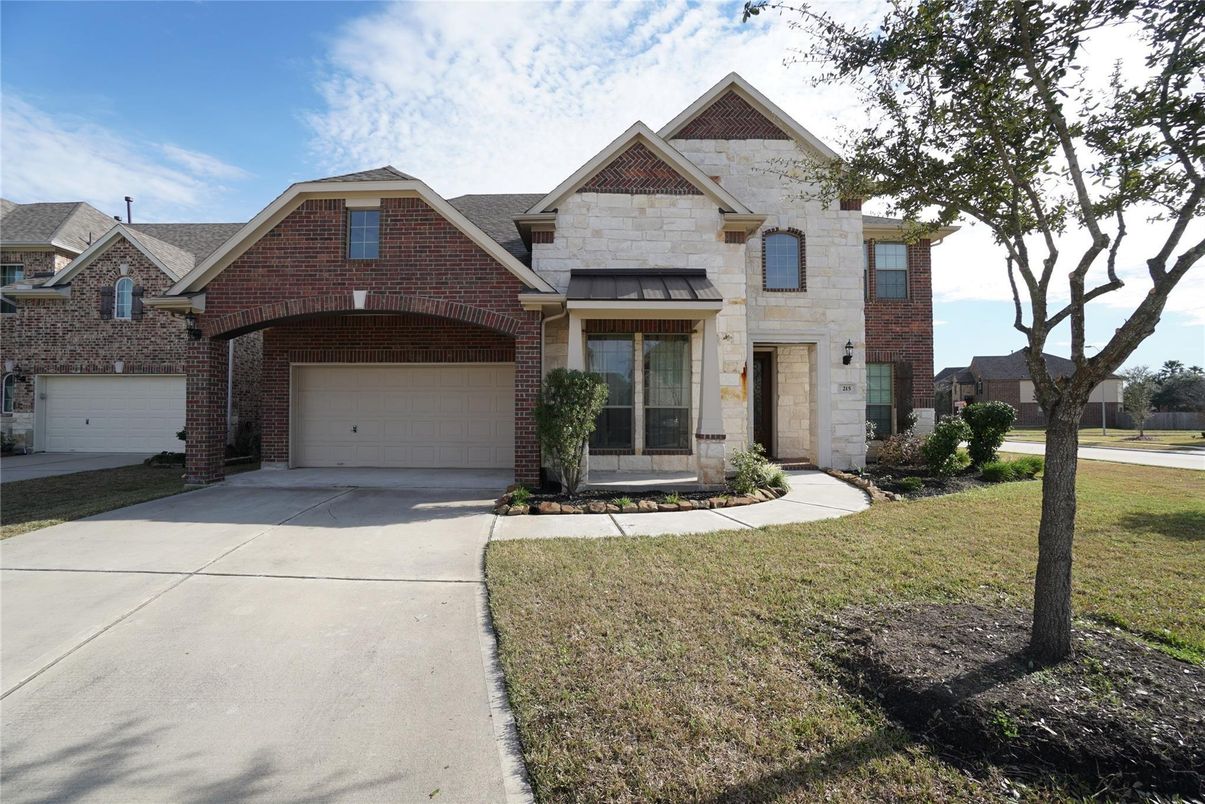 Attached, Exterior, Facade, Brick Facade, Brick Traditional