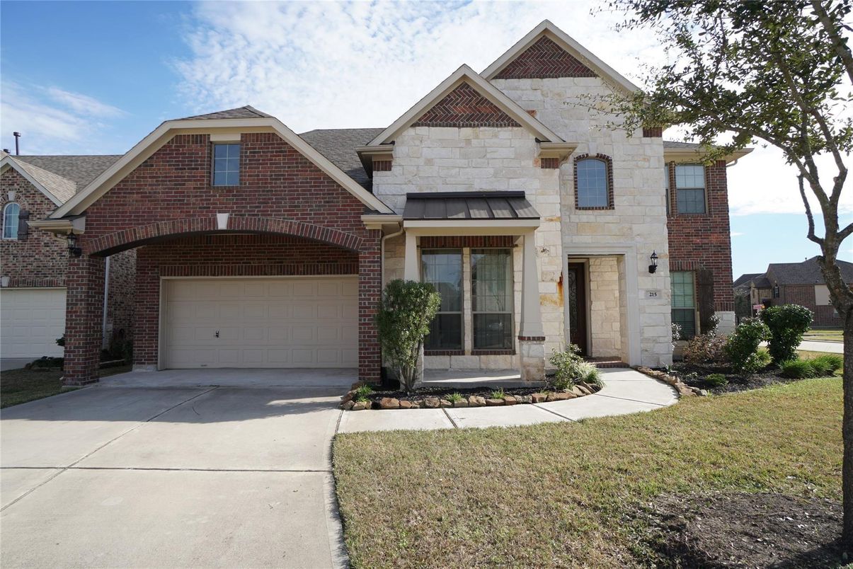 Attached, Exterior, Facade, Brick Facade, Brick Traditional