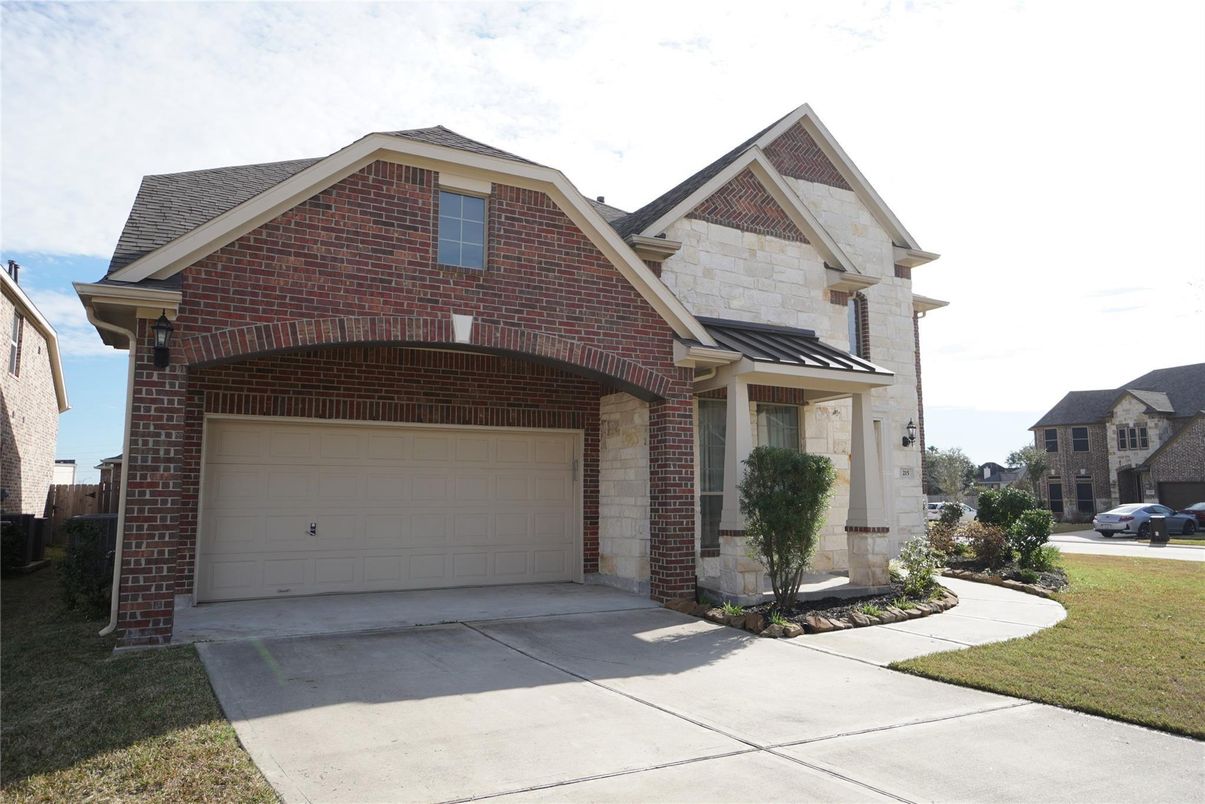 Attached, Exterior, Facade, Brick Facade, Brick Traditional