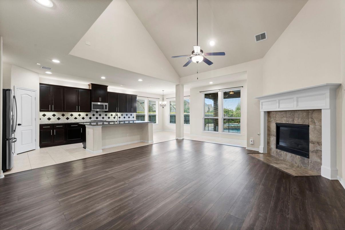 Empty room, Fireplace, Interior, Kitchen, Recessed Lighting, Wood Texture Flooring