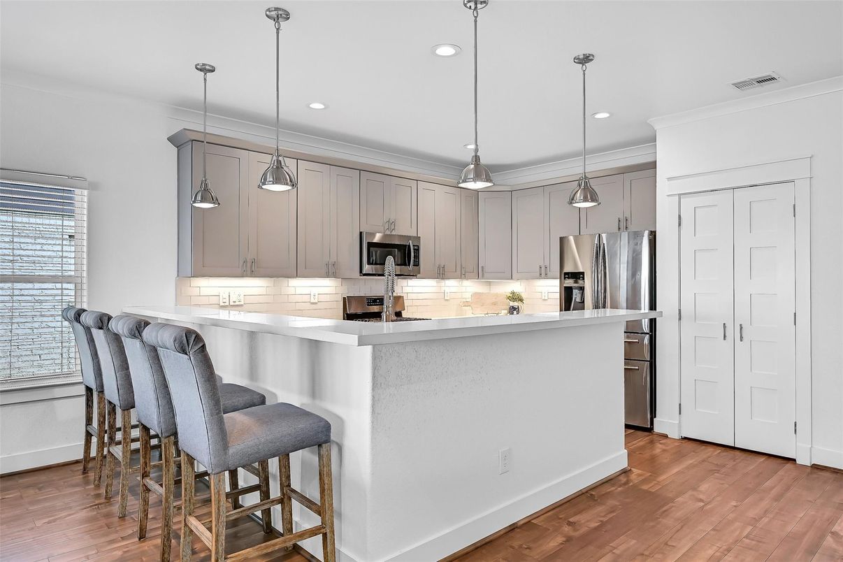 Interior, Kitchen, Pendant Lights, Recessed Lighting, Stainless Steel Appliances, Wood Texture Flooring