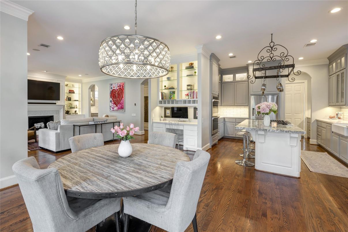 Dining room, Fireplace, Interior, Kitchen, Living room, Pendant Lights, Recessed Lighting, Stainless Steel Appliances, Wood Texture Flooring
