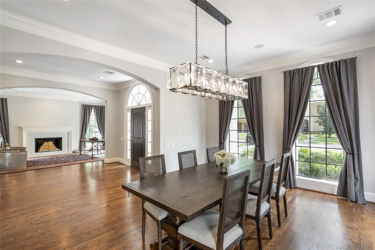 Dining room, Fireplace, Interior, Pendant Lights, Recessed Lighting, Wood Texture Flooring