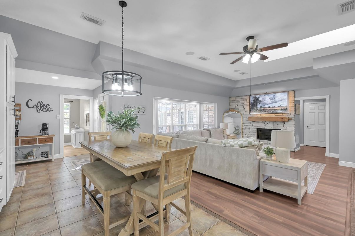 Dining room, Fireplace, Interior, Living room, Pendant Lights, Recessed Lighting, Wood Texture Flooring