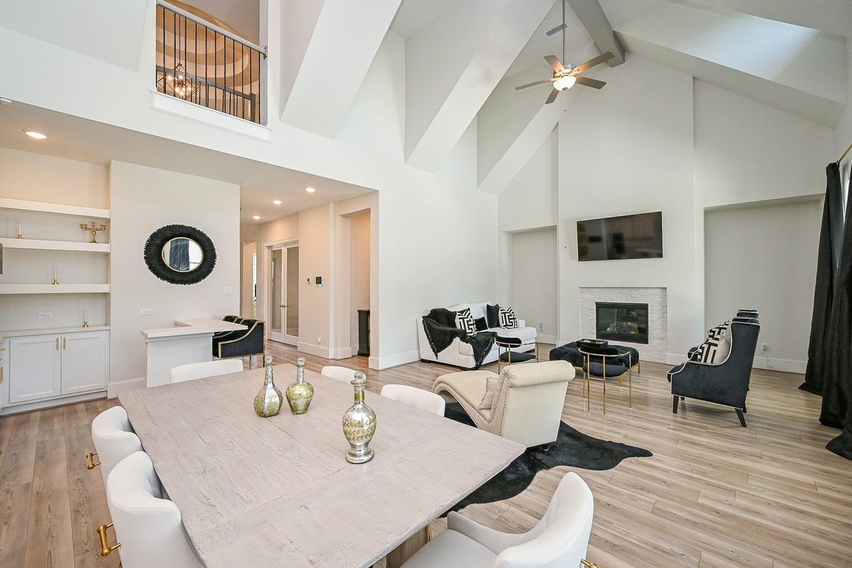 Dining room, Fireplace, Interior, Living room, Recessed Lighting, Wood Texture Flooring