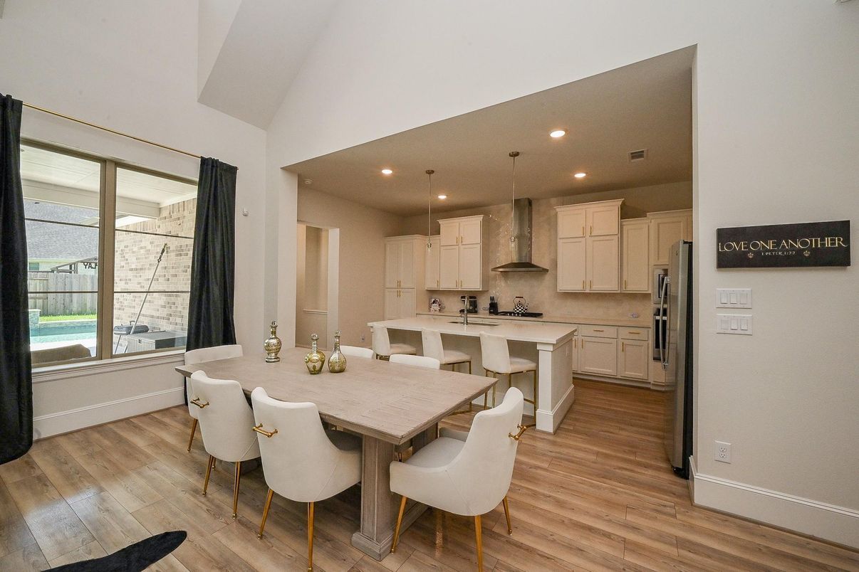 Dining room, Interior, Kitchen, Pendant Lights, Recessed Lighting, Stainless Steel Appliances, Wood Texture Flooring