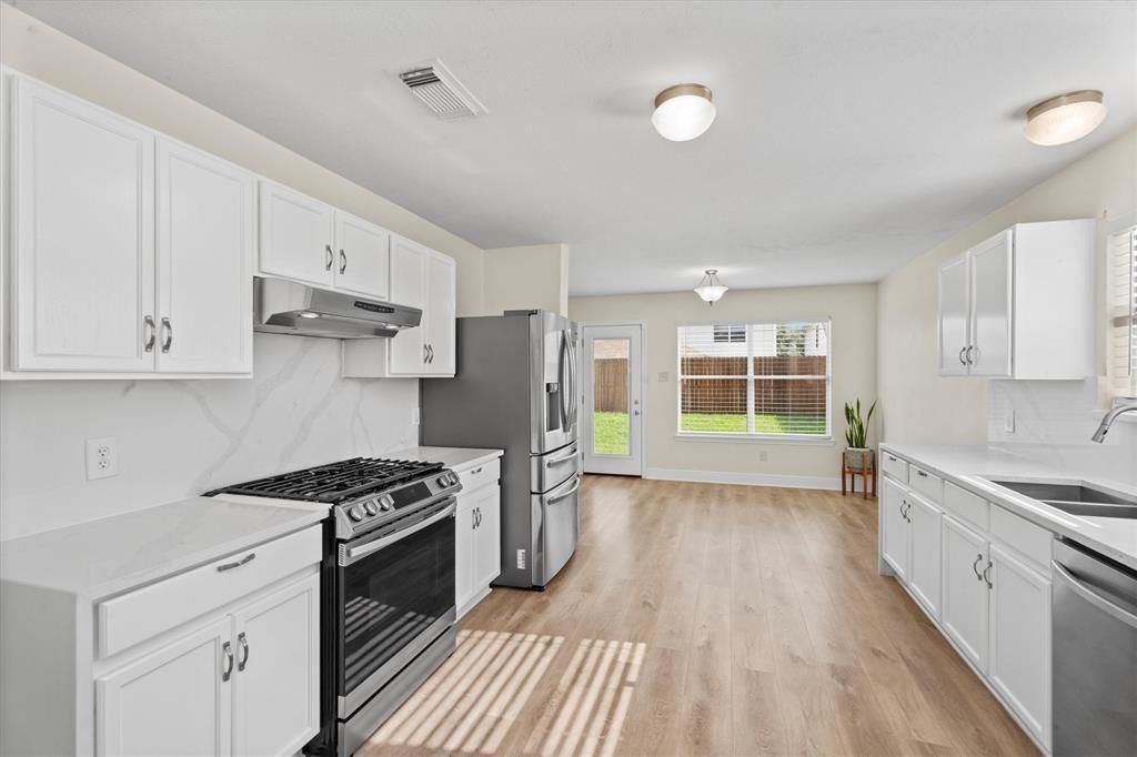 Interior, Kitchen, Marble Walls, Stainless Steel Appliances, Wood Texture Flooring