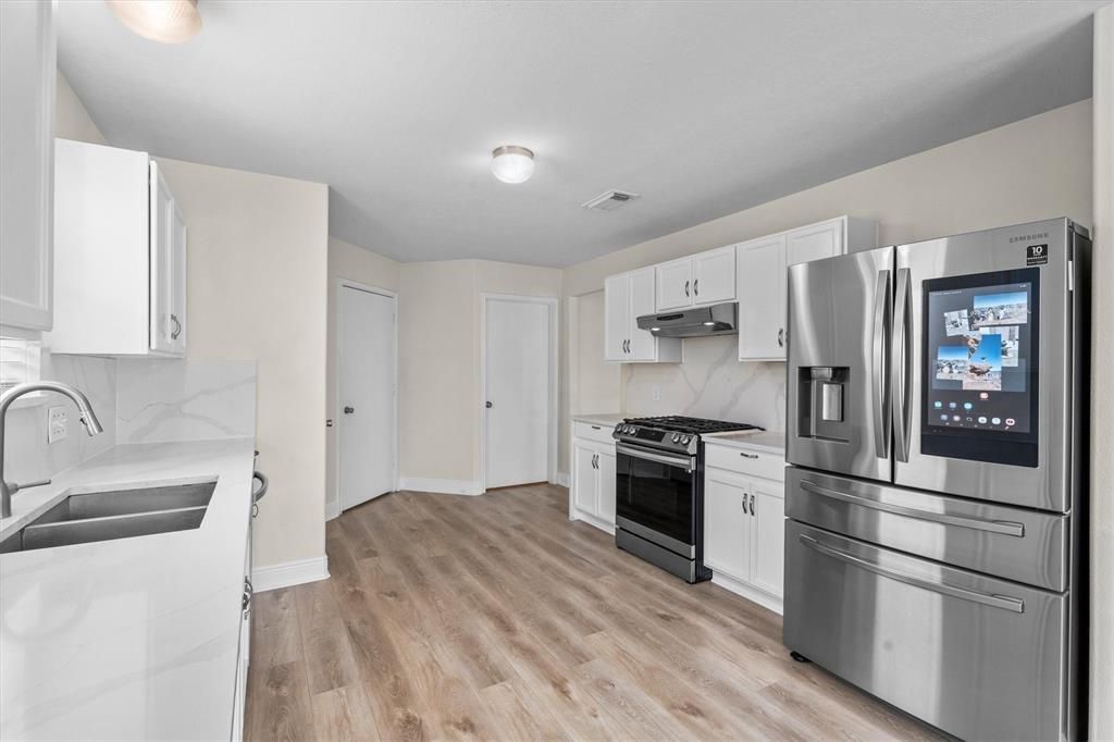 Interior, Kitchen, Stainless Steel Appliances, Wood Texture Flooring