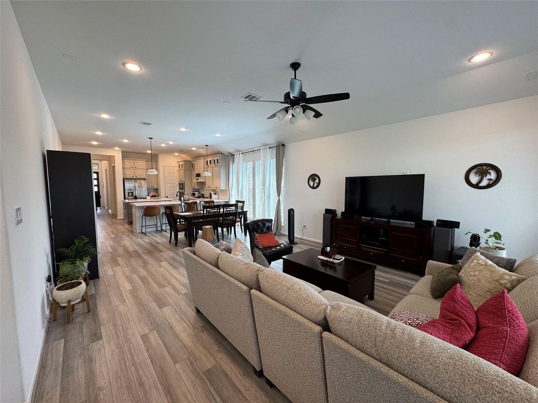 Dining room, Interior, Kitchen, Living room, Pendant Lights, Recessed Lighting, Stainless Steel Appliances, Wood Texture Flooring
