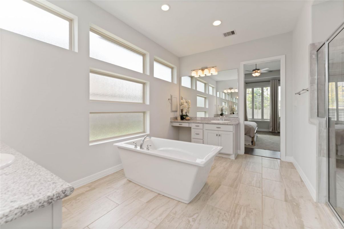 Bathroom, Dual Sink Vanities, Free Standing Baths, Interior, Marble, Recessed Lighting, Wood Texture Flooring