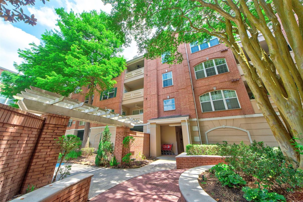 Exterior, Facade, Brick Facade, Condo Building