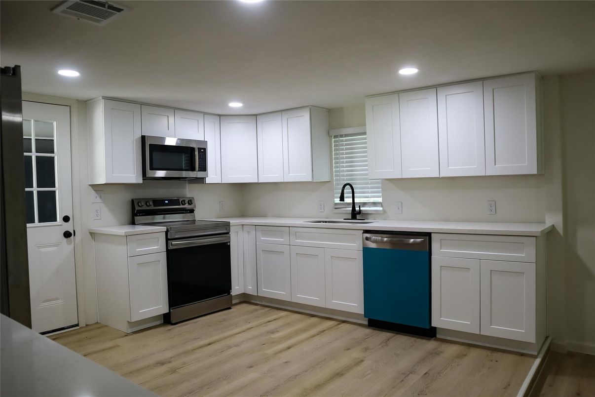 Interior, Kitchen, Recessed Lighting, Stainless Steel Appliances, Wood Texture Flooring